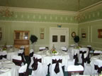 White Chair Covers and Chocolate Taffeta Sash